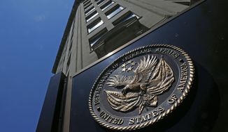 The seal affixed to the front of the Department of Veterans Affairs building in Washington. (AP Photo/Charles Dharapak)
