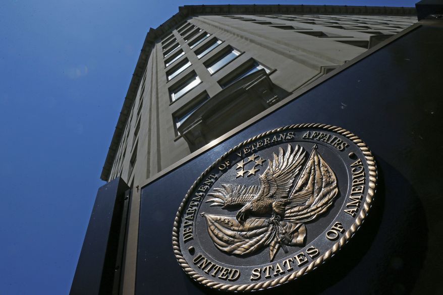 The seal affixed to the front of the Department of Veterans Affairs building in Washington. (AP Photo/Charles Dharapak)
