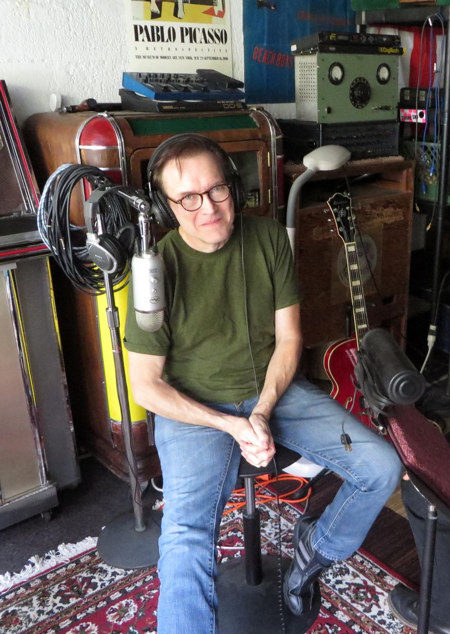 In this Aug. 5, 2015 photo, Billy West poses in his garage in the Hollywood section of Los Angeles. A leading voiceover artist known for title characters on such kids' cartoons as "Doug" and "Ren & Stimpy," West has his own podcast called, "The Billy West Show." (AP Photo/Frazier Moore)