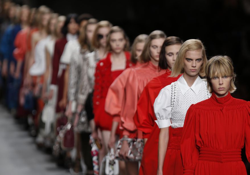 Models wear ccreations for Fendi women's spring-summer 2016 collection, part of the Milan Fashion Week, unveiled in Milan, Italy, Thursday, Sept. 24, 2014. (AP Photo/Luca Bruno)