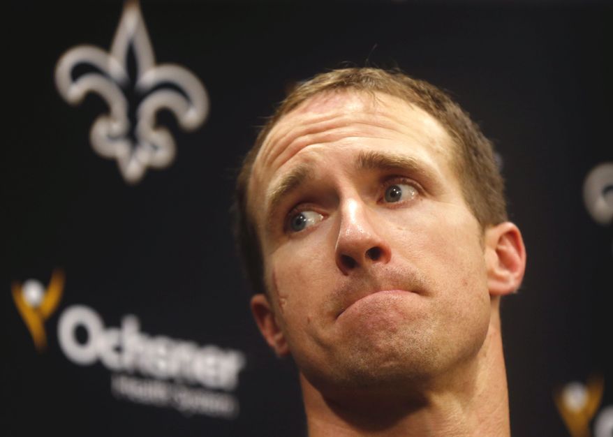 New Orleans Saints quarterback Drew Brees talks to the media regarding his shoulder injury from last Sunday's game against the Tampa Bay Buccaneers, during a news conference at their NFL football training facility in Metairie, La., Wednesday, Sept. 23, 2015. (AP Photo/Gerald Herbert)