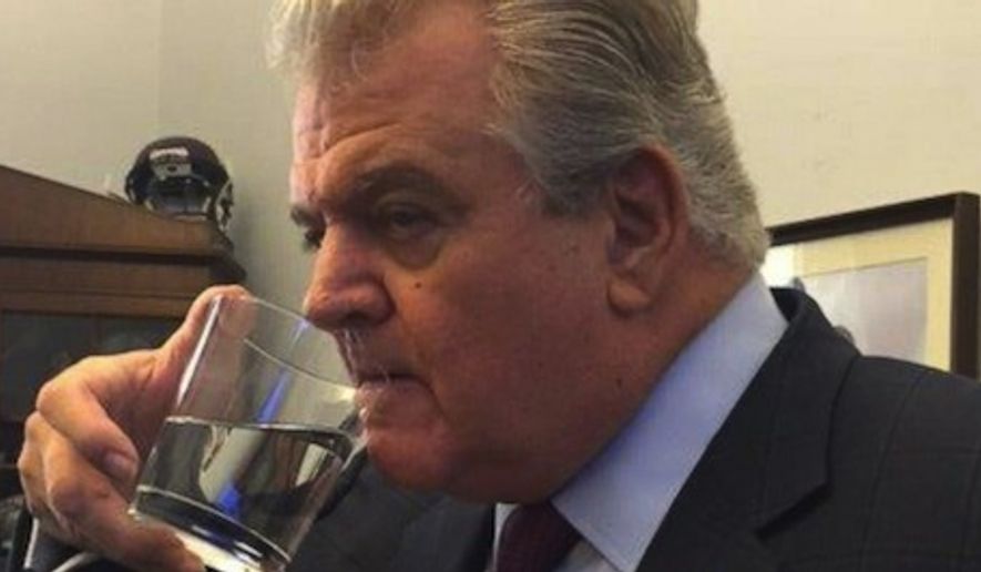 Representative Bob Brady, D-Pa., drinks out of the glass that Pope Francis drank out of during his speech to Congress Sept. 25, 2015. (ABC News, courtesy of Rep. Bob Brady)