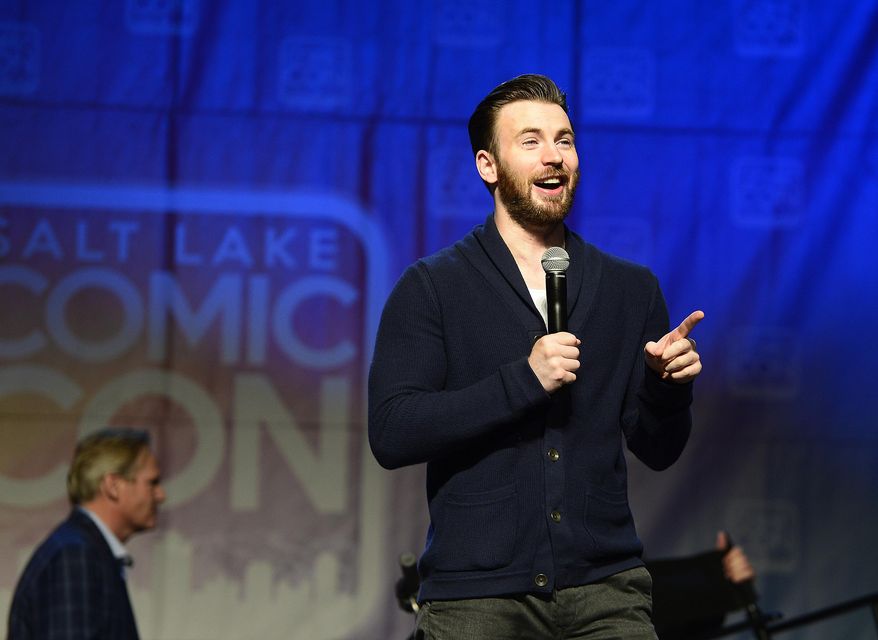 Actor Chris Evans speaks during a panel at Comic Con in Salt Lake City on Saturday, Sept. 26, 2015. On Saturday, Evans said that he was "riddled with foolish, foolish, regrettable insecurity" when he played the Captain America role for the first time. (Scott Sommerdorf/The Salt Lake Tribune via AP)