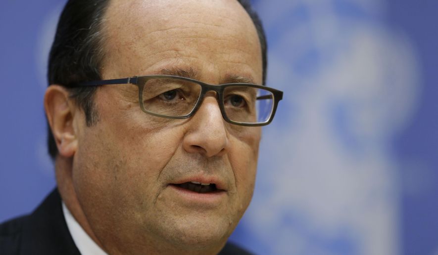 French President Francois Hollande speaks at a news conference at U.N. headquarters, Sunday, Sept. 27, 2015. President Hollande says six French jet fighters targeted and destroyed an Islamic State training camp in eastern Syria. (AP Photo/Seth Wenig)