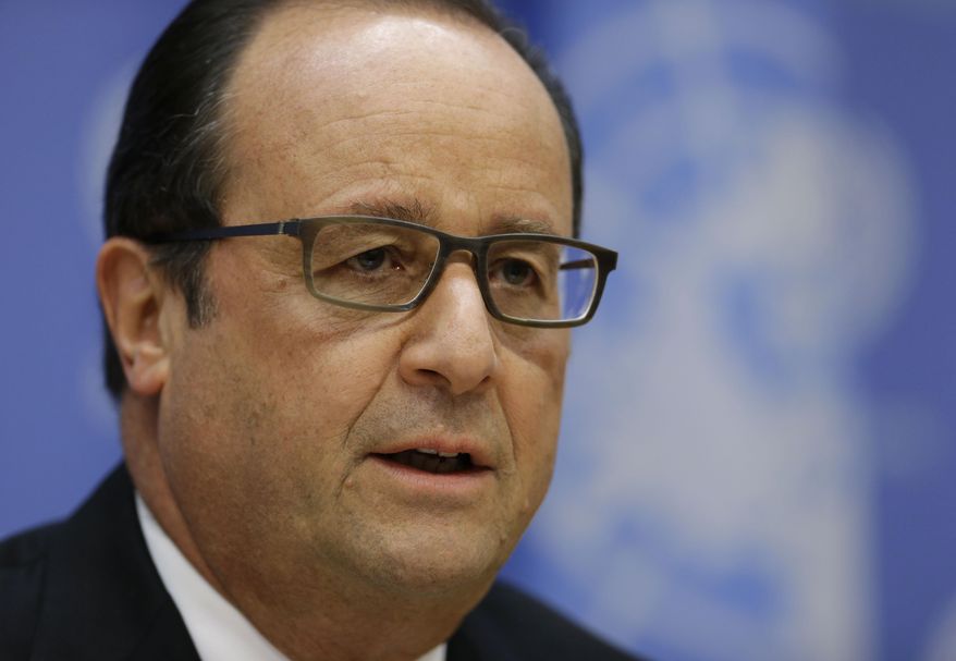 French President Francois Hollande speaks at a news conference at U.N. headquarters, Sunday, Sept. 27, 2015. President Hollande says six French jet fighters targeted and destroyed an Islamic State training camp in eastern Syria. (AP Photo/Seth Wenig)