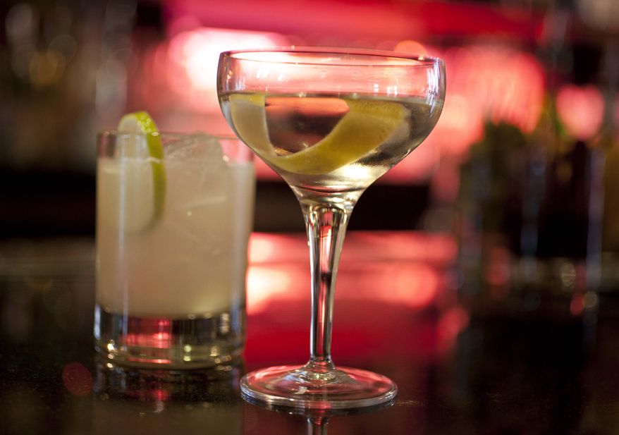 In this Thursday, Dec. 20, 2012, file photo, mixed drinks sit on a hotel bar in San Francisco. (AP Photo/Eric Risberg, File)