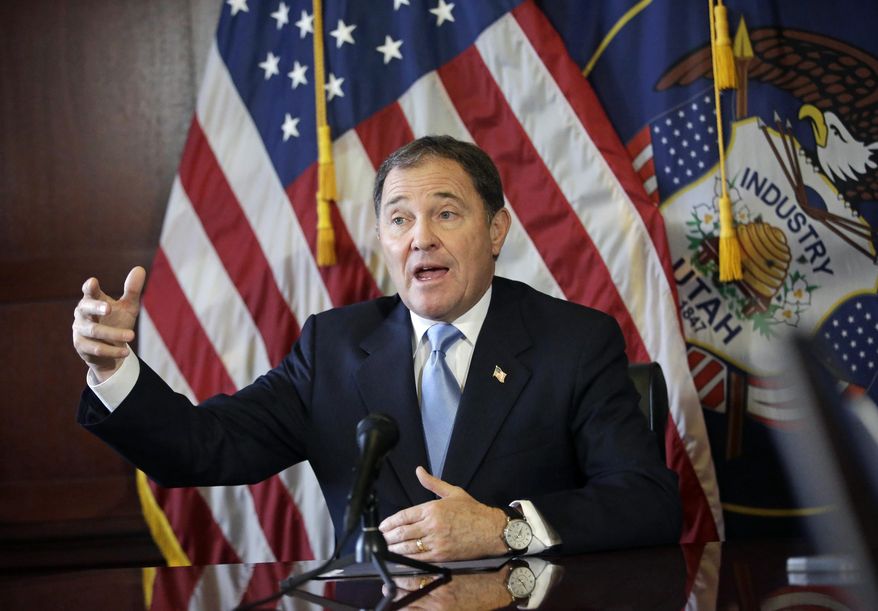 FILE - In this Thursday, Feb. 5, 2015 file photo, Utah Gov. Gary Herbert speaks during a news conference at the Utah State Capitol, in Salt Lake City. Planned Parenthood of Utah sued the governor on Monday, Sept. 28, for ordering state agencies to cut off federal funding to the organization following the release of secretly recorded videos by an anti-abortion group. (AP Photo/Rick Bowmer, File)