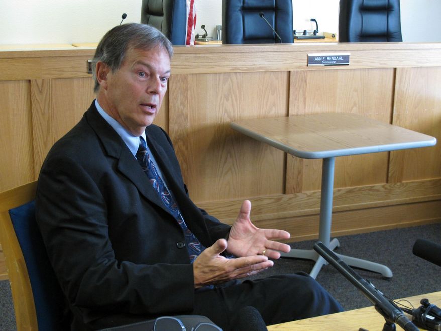 David Pratt, the assistant director for transportation safety at the Washington state Utilities and Transportation Commission, talks to members of the media Monday, Sept. 28, 2015, in Olympia, Wash., after the commission suspended the operations of a Seattle tour company, pending a review following a deadly crash that involved a repurposed military "duck boat." (AP Photo/Rachel La Corte)