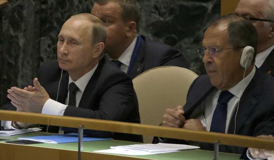 Russian President Vladimir Putin, left, and Foreign Minister Sergei Lavrov listen as Chinese President Xi Jinping addresses the 70th session of the United Nations General Assembly at U.N. headquarters, Monday, Sept. 28, 2015. (AP Photo/Mary Altaffer)