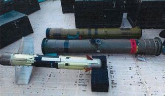 In this image posted on the official Twitter account of the Saudi Press agency, SPA, Tuesday, Sept. 30, 2015, confiscated weapons are seen aboard an Iranian fishing boat bound for Yemen. The Saudi-led coalition battling Yemen&#39;s Shiite rebels says it has foiled an attempt by Iran to smuggle missiles and other weapons to the rebels aboard a fishing boat. The coalition says in a statement released Wednesday that the seizure took place on Saturday some 241 kilometers (150 miles) southeast of the Omani port of Salalah. (Saudi Press Agency via AP)