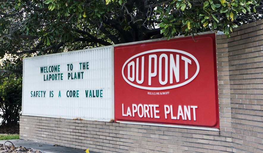 FILE - This undated file photo shows signage at the DuPont Facility in La Porte, Texas. Officials said Wednesday, Sept. 30, 2015, that a federal investigation into a poisonous gas leak that killed four workers at the Houston-area chemical plant in November, 2014 found weaknesses and failures in the facility's safety planning and procedures. (Marie D. De Jesus/Houston Chronicle via AP, File) MANDATORY CREDIT
