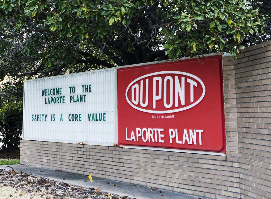 FILE - This undated file photo shows signage at the DuPont Facility in La Porte, Texas. Officials said Wednesday, Sept. 30, 2015, that a federal investigation into a poisonous gas leak that killed four workers at the Houston-area chemical plant in November, 2014 found weaknesses and failures in the facility's safety planning and procedures. (Marie D. De Jesus/Houston Chronicle via AP, File) MANDATORY CREDIT