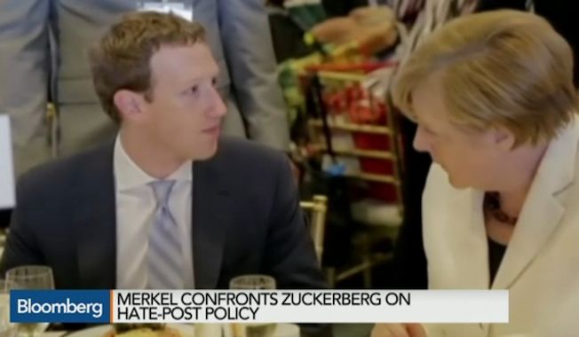 German Chancellor Angela Merkel was overheard on a hot mic confronting Facebook CEO Mark Zuckerberg over anti-immigrant posts, amid complaints from her government that the social network isn&#x27;t doing enough to curtail racist comments. (Bloomberg News/File)