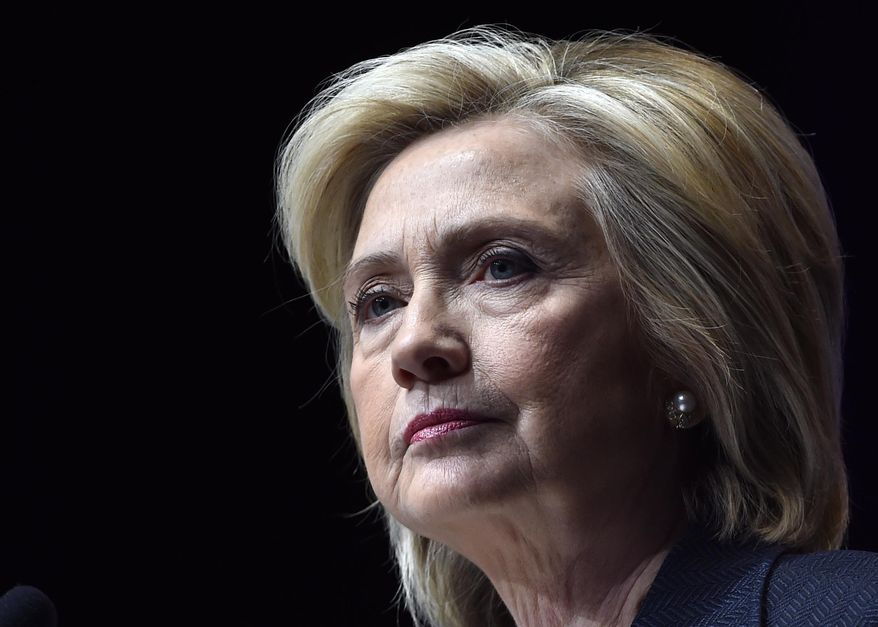 In this June 18, 2015 file photo, Democratic presidential candidate Hillary Rodham Clinton speaks at the National Association of Latino Elected and Appointed Officials in Las Vegas. Clinton's campaign is planning a major push to organize Latino voters ahead of the Nevada caucuses and early primary contests in Texas, Florida and Colorado, all with an eye toward connecting with Hispanics in the 2016 election. (AP Photo/David Becker)