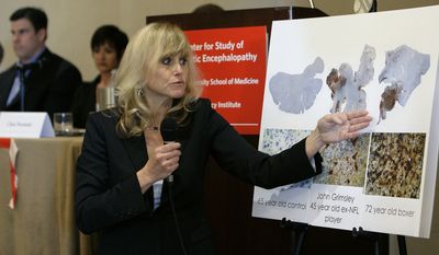 Dr. Ann McKee, of Boston University School of Medicine, talks about damaged human brains during a news conference about chronic traumatic encephalopathy Tuesday Jan. 27, 2009 in Tampa, Fla. (AP Photo/Chris O&#x27;Meara)