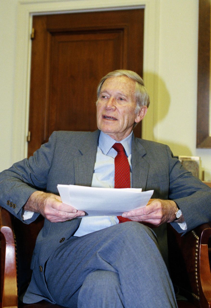 FILE - In this Jan. 1990 file photo, Rep. Don Edwards, D-Calif. poses in his office on Capitol Hill in Washington, a longtime champion of civil rights and the environment during his three decades in Washington, has died at the age of 100. (AP Photo/John Duricka, File)