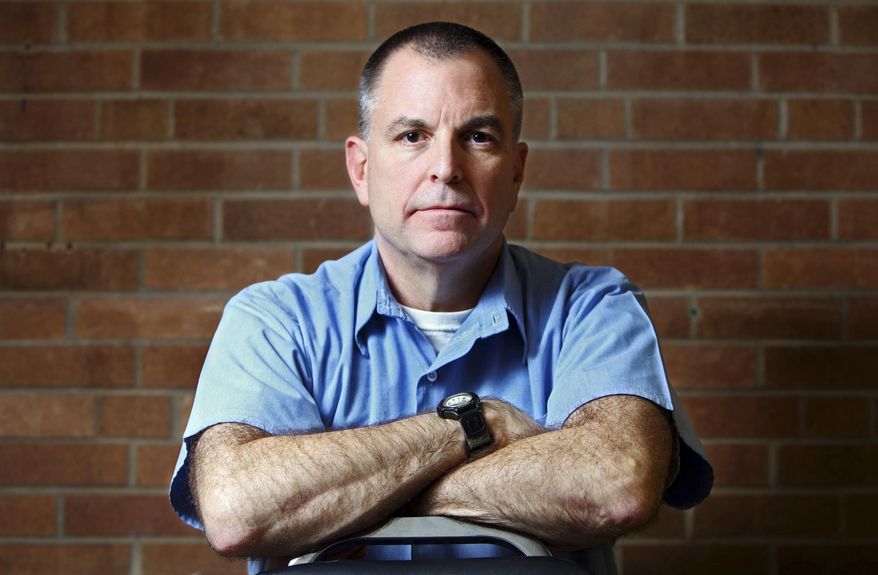 FILE - In this Feb. 22, 2010 file photo, Tom Noe, a former Republican fundraiser and Toledo-area coin dealer convicted of stealing from an Ohio investment fund, poses for a photo at the Hocking Correctional Facility in Nelsonville, Ohio. On Friday, Oct. 2, 2015, Ohio Gov. John Kasich denied a clemency request from the 61-year-old Noe, serving an 18-year sentence for stealing from a $50 million rare-coin fund that he oversaw for the Ohio Bureau of Workers' Compensation. (Shari Lewis/The Columbus Dispatch via AP, File)
