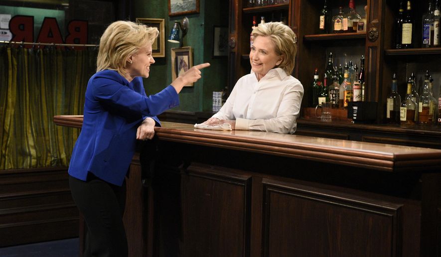 In this Saturday, Oct. 3, 2015, photo, provided by NBC, Kate McKinnon, left, portraying Hillary Rodham Clinton, and Hillary Rodham Clinton, right, portraying Val, appear during the "Bar Talk" sketch on "Saturday Night Live," in New York. Most political candidates play themselves on "SNL," often for just a cameo in a sketch or to declare the show's famous tag line, "Live from New York, it's Saturday night!" Seldom do they play a character in a sketch, as did Clinton. (Dana Edelson/NBC via AP)