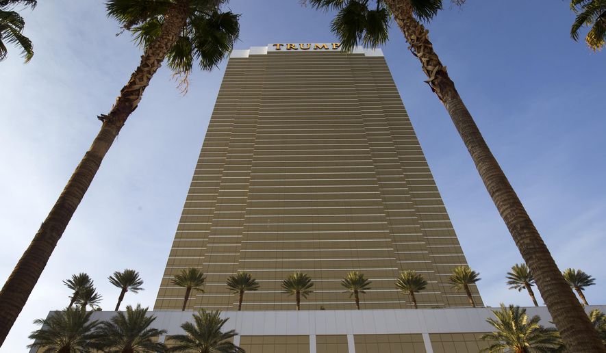 This Aug. 21, 2015 file photo shows the Trump International Hotel in Las Vegas. Customer credit and debit card numbers may have been stolen at seven Trump hotels after its payment systems were hacked for nearly a year. (Steve Marcus/Las Vegas Sun via AP, File)