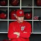 Washington Nationals manager Matt Williams (9) pauses in the dugout before a baseball game against the Philadelphia Phillies at Nationals Park, Friday, May 22, 2015, in Washington. (AP Photo/Alex Brandon)
