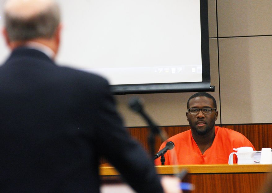 William Holmes testifies during an evidentiary hearing for the Fairbanks Four to try to prove their innocence, Monday, Oct. 5, 2015 at the Rabinowitz Courthouse in Fairbanks, Alaska. The Four, George Frese, Kevin Pease, Eugene Vent and Marvin Roberts were convicted in the killing of 15-year old John Hartman 18 years ago. Roberts was released on parole this summer, the other three men remain in jail. (Eric Engman/Fairbanks Daily News-Miner via AP)
