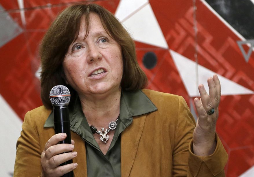 In this photo taken on Tuesday, Sept. 16, 2014, Belarusian journalist Svetlana Alexievich speaks in Minsk, Belarus. Belarusian writer Svetlana Alexievich won the Nobel Prize in literature Thursday, Oct. 8, 2015, for works that the prize judges called "a monument to suffering and courage." (AP Photo/Sergei Grits)