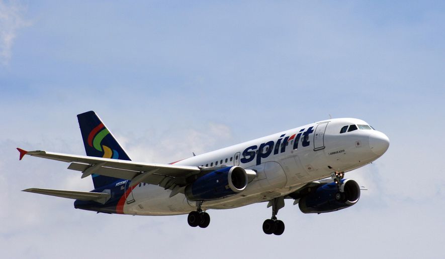 In June 2015 photo, a Spirit Airlines plane approaches Chicago O&#x27;Hare International Airport in Chicago.  (Bill Montgomery/Houston Chronicle via AP) MANDATORY CREDIT **FILE**