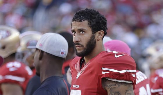 San Francisco 49ers quarterback Colin Kaepernick (7) stands on the sideline during the second half of an NFL football game against the Green Bay Packers in Santa Clara, Calif., Sunday, Oct. 4, 2015. The Packers won 17-3. (AP Photo/Ben Margot) **FILE**