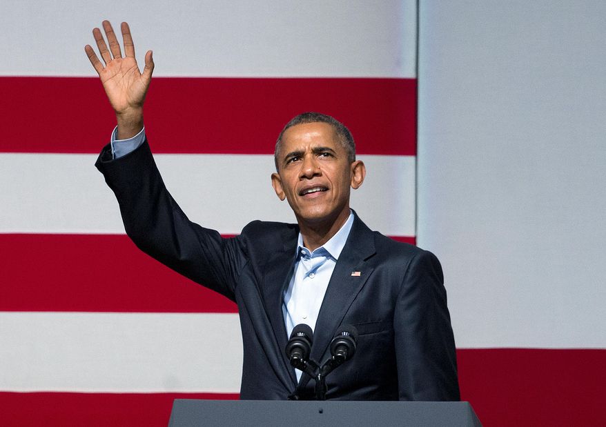 President Barack Obama waves to guests as he takes the stage during a Democratic fundraiser at the Warfield Theater, Saturday, Oct. 10, 2015 in San Francisco. (AP Photo/Pablo Martinez Monsivais)
