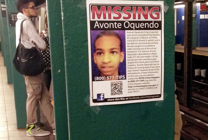 FILE - In this Oct. 21, 2013, file photo, a missing poster displayed in a New York subway station asks for help in finding Avonte Oquendo, an autistic 14-year-old who was last seen walking out of his Queens school toward a park overlooking the East River. Oquendo’s remains were found in the East River in January 2014, several miles from where he vanished. Two years after his death, New York City teachers and school employees are receiving additional training on serving autistic pupils. (AP Photo/Barbara Woike, File)