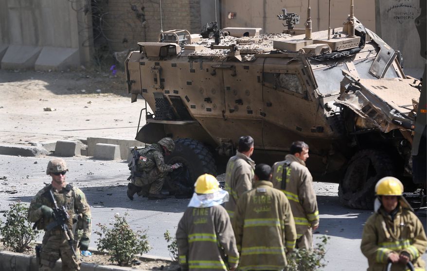 Sidelined: A lack of striking against Islamic State forces in Afghanistan by the U.S. and its allies has allowed the Islamic State to nearly reach the capital of Kabul. (Associated Press)