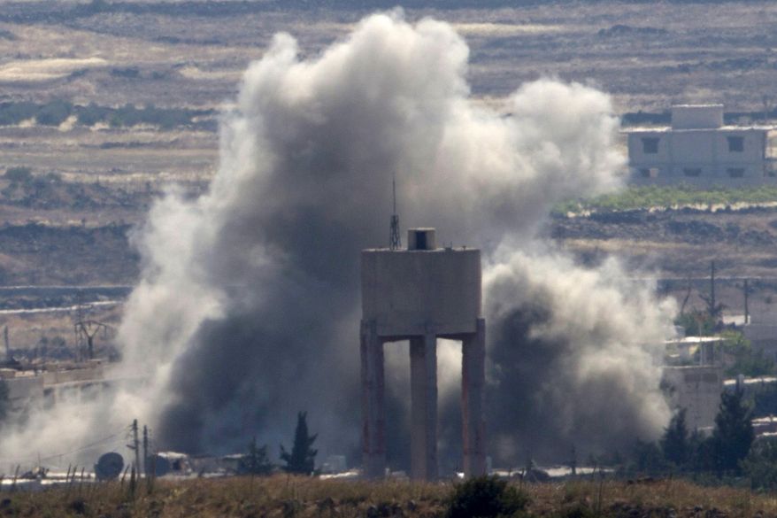 FILE - In this June 17, 2015 file photo, smoke and explosions from fighting between forces loyal to Syrian President Bashar Assad and rebels in the Quneitra area of Syria are seen from the Israeli-occupied Golan Heights. The Russian military intervention to prop up the Syrian government has put new scrutiny on the CIA’s secret support to Syrian rebels fighting Bashar Assad, raising questions about how far the U.S. is willing to go in empowering its proxies to take on Vladimir Putin’s allies. (AP Photo/Ariel Schalit, File)