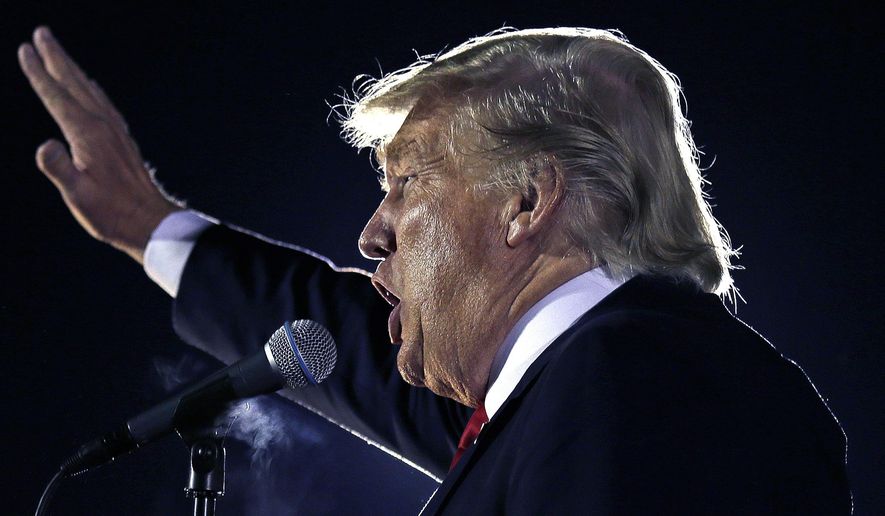 Republican presidential candidate Donald Trump addresses a crowd during a campaign rally in Tyngsborough, Mass., Friday, Oct. 16, 2015. (AP Photo/Charles Krupa)