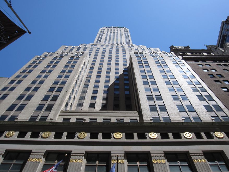 The Trump Building at 40 Wall Street - Built in 1930, Donald Trump bought this 70-story skyscraper in 1995. This commercial space was designated a landmark by the New York City Landmarks Preservation Commission. The tower is the tallest mid-block building in the city. Photo: wikipedia.org