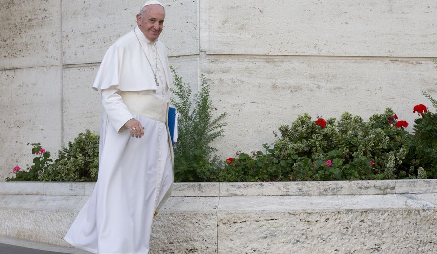Pope Francis leaves after a morning session of the Synod of bishops, Friday, Oct. 16, 2015. (AP Photo/Alessandra Tarantino)