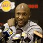 In this July 31, 2009, file photo, Los Angeles Lakers&#39; Lamar Odom speaks to the media during a news conference after the Lakers signed Odom to a multi-year NBA basketball contract, in El Segundo, Calif. (AP Photo/Jeff Lewis, File)