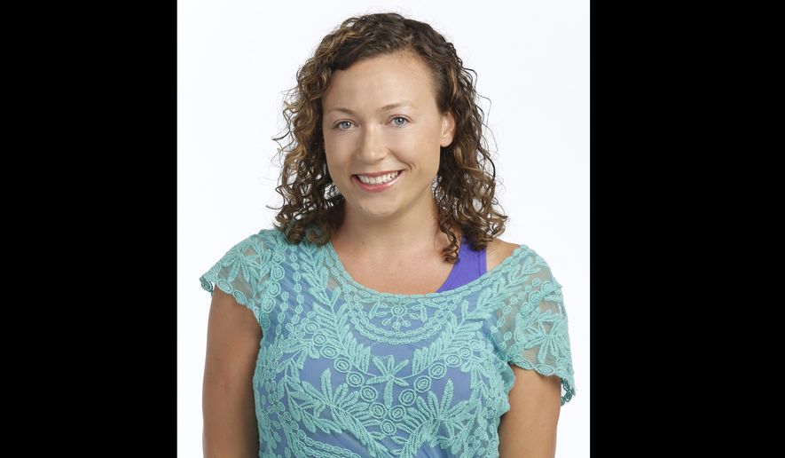 This image released by ABC shows Jamie Zimmerman, a doctor and reporter with ABC News' medical unit, in New York. Zimmerman died on Monday, Oct. 12, 2015, while on vacation in Hawaii. She apparently lost her footing while trying to cross the Lumahai River on Kauai's north shore and was swept out to sea. (Heidi Gutman/ABC via AP)