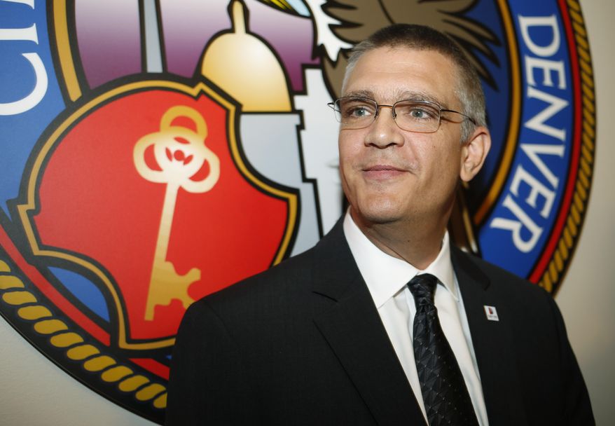 Patrick Firman talks to reporters after he was introduced as the new sheriff of the Denver Sheriff's Department Thursday, Oct. 15, 2015, in Denver. Firman, who has 24 years of uniformed and jail management experience in counties north of Chicago, is taking over a Denver department that is undergoing extensive reforms after a series of high-profile misconduct scandals and large payouts in excessive force cases. (AP Photo/David Zalubowski)