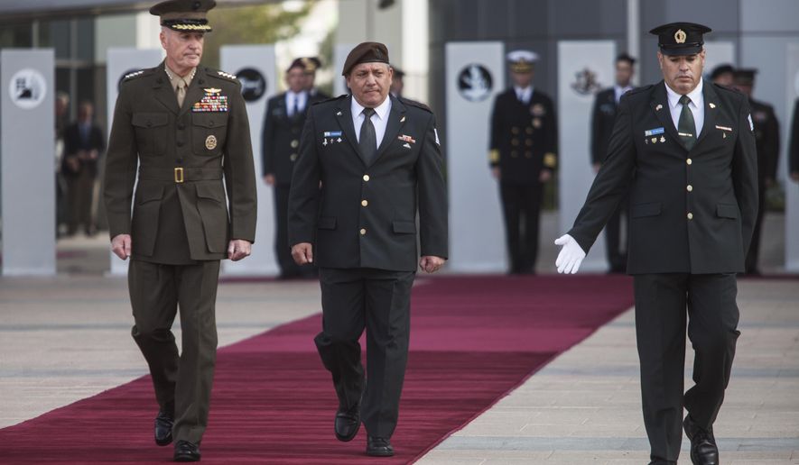 Israeli Chief of Staff Lt. Gen. Gadi Eizenkot, right, inspects the honor guard with United States Chairman of the Joint Chiefs of Staff General Joseph F. Dunford, during a welcoming ceremony at Tel Aviv, Israel. Sunday, Oct. 18, 2015. (AP Photo/Dan Balilty)
