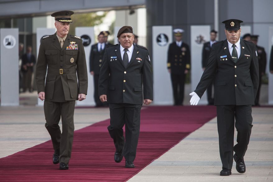 Israeli Chief of Staff Lt. Gen. Gadi Eizenkot, right, inspects the honor guard with United States Chairman of the Joint Chiefs of Staff General Joseph F. Dunford, during a welcoming ceremony at Tel Aviv, Israel. Sunday, Oct. 18, 2015. (AP Photo/Dan Balilty)