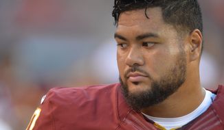 Washington Redskins defensive tackle Stephen Paea stands on the sideline during an NFL preseason football game against the Cleveland Browns Thursday, Aug. 13, 2015, in Cleveland. Washington won 20-17. (AP Photo/David Richard)
