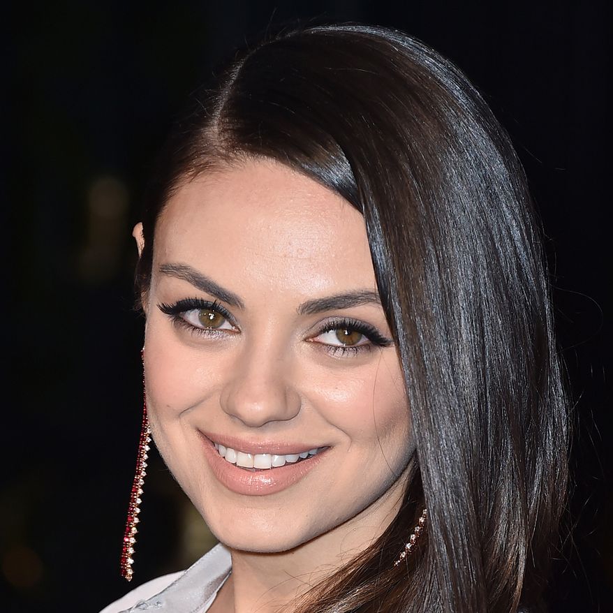 Mila Kunis attends Burberry's "London in Los Angeles" event at the Griffith Observatory on Thursday, April 16, 2015. (Photo by Jordan Strauss/Invision/AP)