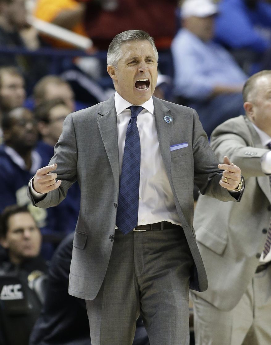 FILE - In this March 10, 2015, file photo, Georgia Tech head coach Brian Gregory reacts to a call during the second half of an NCAA college basketball game against Boston College in the first round of the Atlantic Coast Conference tournament in Greensboro, N.C.  Gregory, under a mandate to show progress in his fifth season as Georgia Tech’s coach, is relying on veteran transfers to make the Yellow Jackets relevant again in the ACC. Gregory has only one winning record and no postseason appearances in his first four seasons.. (AP Photo/Bob Leverone, File)