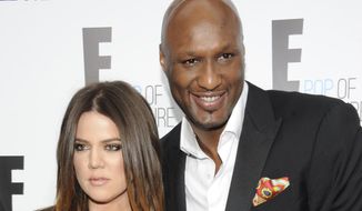 FILE - In this April 30, 2012, file photo, Khloe Kardashian Odom and Lamar Odom from the show &amp;quot;Keeping Up With The Kardashians&amp;quot; attend an E! Network upfront event at Gotham Hall in New York. A family representative says Lamar Odom has left a Las Vegas hospital and is now in the Los Angeles area to continue his recovery a week after being found unconscious at a Nevada brothel. Alvina Alston, publicist for Odom&#39;s aunt JaNean Mercer, said Tuesday, oct. 20, 2015,  that the former NBA star was transported by helicopter from Sunrise Hospital and Medical Center in Las Vegas around 5 p.m. Monday. (AP Photo/Evan Agostini, File)