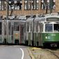 In this Thursday, June 18, 2015 file photo, a Massachusetts Bay Transportation Authority Green Line subway train moves along the track in Boston. (AP Photo/Steven Senne, File )