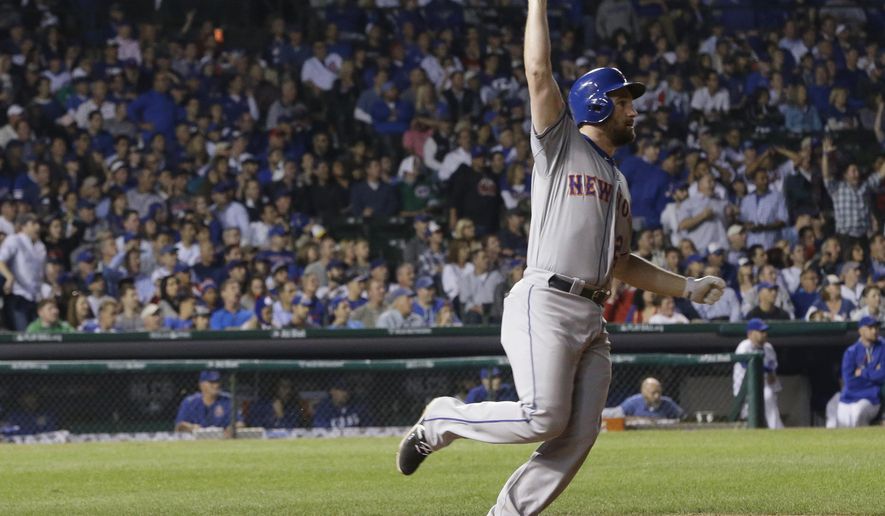 New York Mets&#x27; Daniel Murphy rounds first after hitting a home run during the eighth inning of Game 4 of the National League baseball championship series against the Chicago Cubs Wednesday, Oct. 21, 2015, in Chicago.  (AP Photo/David J. Phillip)