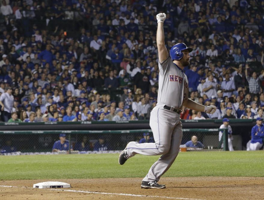 New York Mets&#39; Daniel Murphy rounds first after hitting a home run during the eighth inning of Game 4 of the National League baseball championship series against the Chicago Cubs Wednesday, Oct. 21, 2015, in Chicago.  (AP Photo/David J. Phillip)