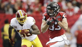 Atlanta Falcons tight end Jacob Tamme (83) runs against Washington Redskins free safety Dashon Goldson (38) during the first half of an NFL football game, Sunday, Oct. 11, 2015, in Atlanta. (AP Photo/Brynn Anderson)