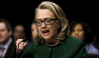 Secretary of State Hillary Rodham as she pounds her fist as she testifies on Jan. 23, 2013 at the Senate Foreign Relations Committee&#39;s hearing on the deadly attack on the U.S. diplomatic mission in Benghazi, Libya. (Associated Press)