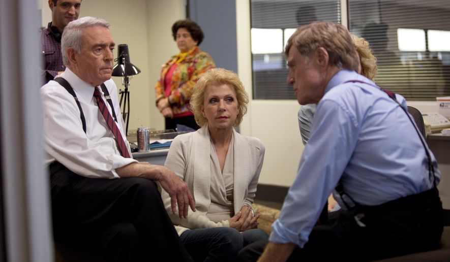 In this image released by Sony Pictures Classics, Dan Rather, from left, Mary Mapes and Robert Redford appear on the set of &amp;quot;Truth.&amp;quot; (Lisa Tomasetti /Sony Pictures Classics via AP)